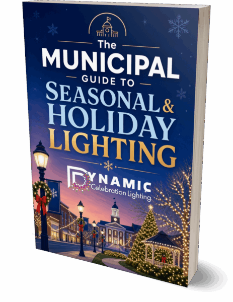 Book titled The Municipal Guide to Seasonal & Holiday Lighting with festive street decorations on the cover.
